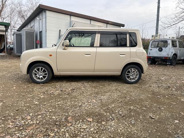 アルトラパン ターボ 4WD キーレスエントリー 電動格納ミラー シートヒーター ベンチシート AT ABS CD MD アルミホイール 衝突安全ボディ エアコン パワーステアリング パワーウィンドウ(4枚目)