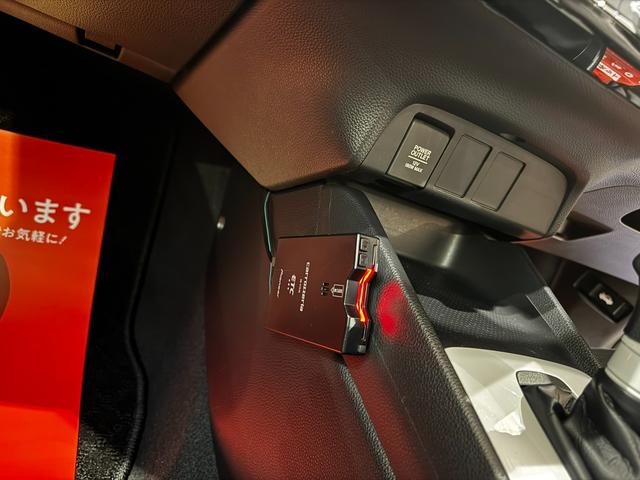 フィット ｅ：ＨＥＶベーシック　４ＷＤ　ホンダセンシング　ＬＥＤオートライト　フロントフォグ　社外ナビ　ＤＶＤ　Ｂｌｕｅｔｏｏｔｈ　バックカメラ　オートエアコン　ミラーヒーター　熱線入フロントガラス　ＥＣＯＮ　横滑り防止（30枚目）