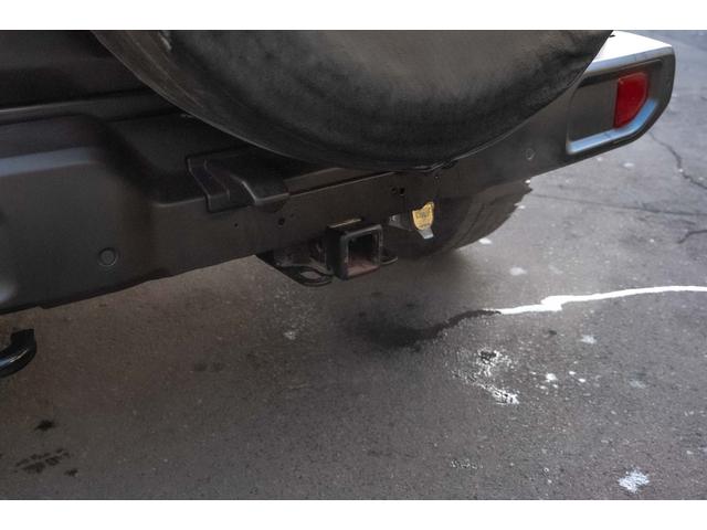 ジープ・ラングラーアンリミテッド サハラ　４ＷＤ　純正ナビ　Ｂカメラ　Ｆカメラ　ＥＴＣ２．０　ドラレコ　フルセグＴＶ　純正アルパインサブウーハー　本革シート　ミラーヒーター　ＢＳＭ　クルコン　携帯ホルダー　純正１８インチＡＷ（32枚目）