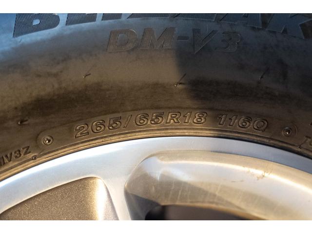 ジープ・ラングラーアンリミテッド サハラ　４ＷＤ　純正ナビ　Ｂカメラ　Ｆカメラ　ＥＴＣ２．０　ドラレコ　フルセグＴＶ　純正アルパインサブウーハー　本革シート　ミラーヒーター　ＢＳＭ　クルコン　携帯ホルダー　純正１８インチＡＷ（65枚目）