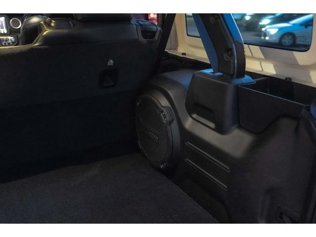 ジープ・ラングラーアンリミテッド サハラ　４ＷＤ　純正ナビ　Ｂカメラ　Ｆカメラ　ＥＴＣ２．０　ドラレコ　フルセグＴＶ　純正アルパインサブウーハー　本革シート　ミラーヒーター　ＢＳＭ　クルコン　携帯ホルダー　純正１８インチＡＷ（66枚目）