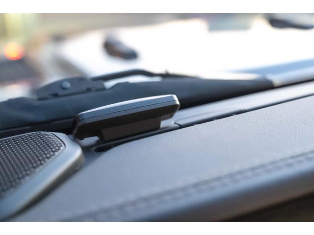 ジープ・ラングラーアンリミテッド サハラ　４ＷＤ　純正ナビ　Ｂカメラ　Ｆカメラ　ＥＴＣ２．０　ドラレコ　フルセグＴＶ　純正アルパインサブウーハー　本革シート　ミラーヒーター　ＢＳＭ　クルコン　携帯ホルダー　純正１８インチＡＷ（69枚目）