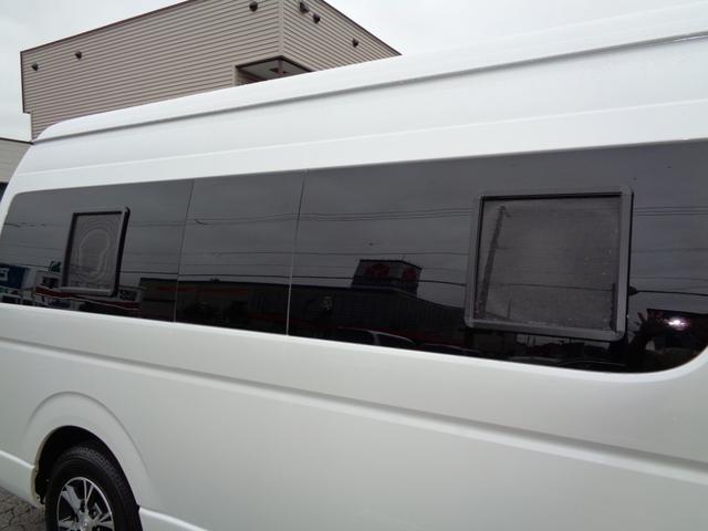 SロングワイドDX 4WD キャンピング 走行6,500km シンク ベッド 電子レンジ 冷蔵庫 リヤガソリンヒーター カーテン テレビ ボディーコーティング 下廻防錆 車庫保管 左パワスラ モデューロエアロ ワンオーナ(35枚目)