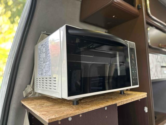 ＮＶ３５０キャラバンバン スーパーロングワイドＤＸ　キャンピング　４ＷＤ　ソーラー充電＆走行充電　バッテリーモニター　ＥＴＣ　ＦＦヒーター　冷蔵庫　電子レンジ　シンク　テーブル　アルミホイール　ＡＴ　エアコン　ツインサブバッテリー　後席モニター（21枚目）