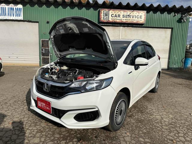 フィットハイブリッド Ｆ　４ＷＤ　ＥＴＣ　バックカメラ　ナビ　スマートキー　電動格納ミラー　ＡＴ　盗難防止システム　衝突安全ボディ　ＵＳＢ　チップアップシート　ＡＢＳ　ＥＳＣ　エアコン　パワーステアリング（49枚目）