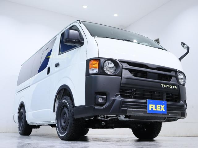 ハイエースバン ロングＤＸ　ＷｏｏｄＲｉｍ　ＢＩＧ－Ｘメカレス　ＥＴＣ　デジタルインナーミラー　パノラミックビューモニター　助手席エアバック　リヤヒーター　クーラー　ＡＣ１００Ｖ　フロントスポイラー　オーバーフェンダー　タイヤ（24枚目）