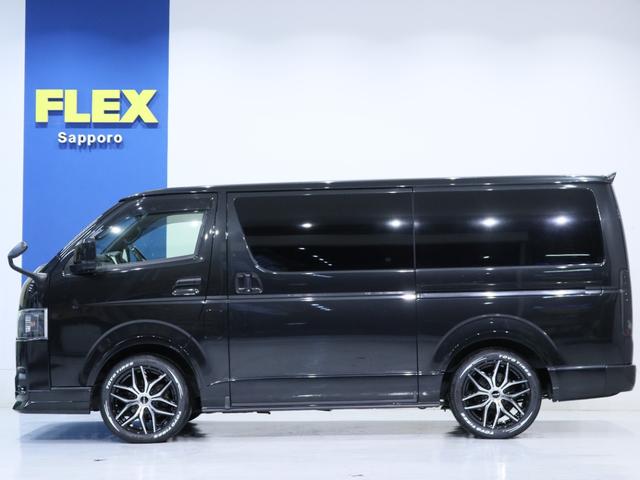 ハイエースバン スーパーGL ダークプライムII インテリジェントクリアランスソナー PVM 助手席エアバック デジタルインナーミラー 寒冷地仕様 パワースライドドア 各所ブラック塗装 社外アルミ18in スポイラー オーバーフェンダー(21枚目)