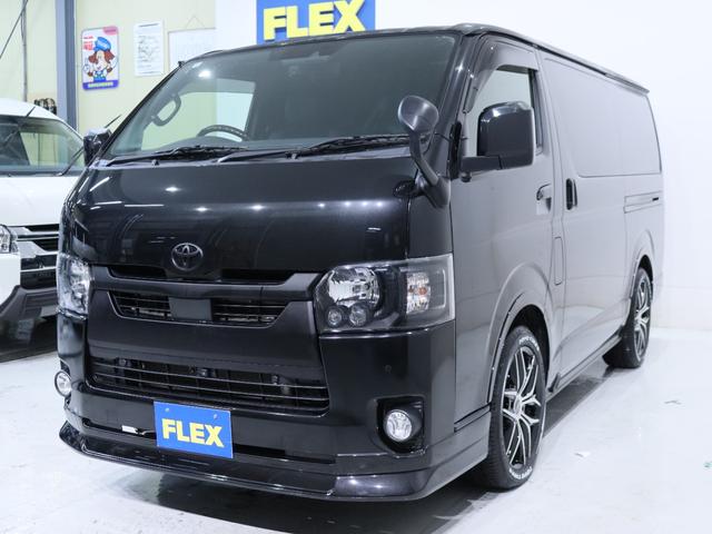 ハイエースバン スーパーGL ダークプライムII インテリジェントクリアランスソナー PVM 助手席エアバック デジタルインナーミラー 寒冷地仕様 パワースライドドア 各所ブラック塗装 社外アルミ18in スポイラー オーバーフェンダー(26枚目)