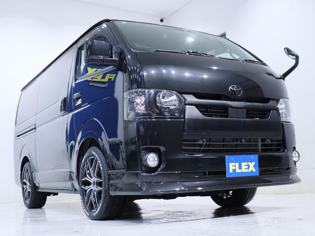 ハイエースバン スーパーGL ダークプライムII インテリジェントクリアランスソナー PVM 助手席エアバック デジタルインナーミラー 寒冷地仕様 パワースライドドア 各所ブラック塗装 社外アルミ18in スポイラー オーバーフェンダー(28枚目)