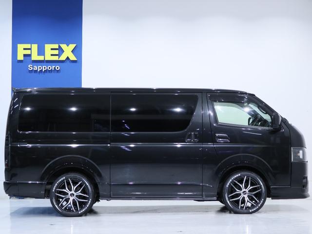 ハイエースバン スーパーGL ダークプライムII インテリジェントクリアランスソナー PVM 助手席エアバック デジタルインナーミラー 寒冷地仕様 パワースライドドア 各所ブラック塗装 社外アルミ18in スポイラー オーバーフェンダー(38枚目)