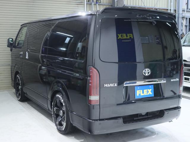 ハイエースバン スーパーＧＬ　ダークプライムＩＩ　デジタルインナーミラー　パノラミックビューモニター　寒冷地仕様　スポイラー　テールランプ　アルミ　タイヤ　１．５ｉｎローダウン　ＢＩＧ－Ｘナビメカレス　後席モニター　ＥＴＣ　フローリング　ベットキット（26枚目）