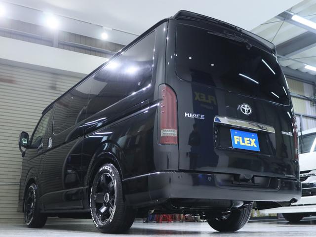 ハイエースバン スーパーＧＬ　ダークプライムＩＩ　デジタルインナーミラー　パノラミックビューモニター　寒冷地仕様　スポイラー　テールランプ　アルミ　タイヤ　１．５ｉｎローダウン　ＢＩＧ－Ｘナビメカレス　後席モニター　ＥＴＣ　フローリング　ベットキット（27枚目）