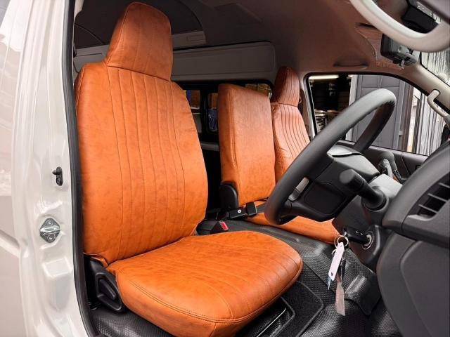 ハイエースバン ＳロングワイドＤＸ　ＧＬパッケージ　フローリング施工　トリムレザー　フロントスポイラー　オーバーフェンダー　Ｄｅｌｆ０６　アルミホイール　ナスカータイヤ　クラシックキャメルシートカバー　Ｔｙｐｅ２ベッドキットＢＩＧ－Ｘフローティングナビ（9枚目）