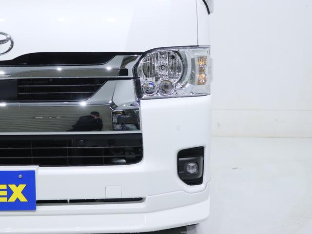 ハイエースバン ＳロングワイドＤＸ　ＧＬパッケージ　フローリング施工　トリムレザー　フロントスポイラー　オーバーフェンダー　Ｄｅｌｆ０６　アルミホイール　ナスカータイヤ　クラシックキャメルシートカバー　Ｔｙｐｅ２ベッドキットＢＩＧ－Ｘフローティングナビ（33枚目）
