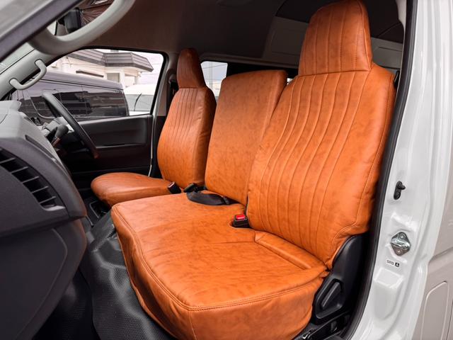 ハイエースバン ＳロングワイドＤＸ　ＧＬパッケージ　フローリング施工　トリムレザー　フロントスポイラー　オーバーフェンダー　Ｄｅｌｆ０６　アルミホイール　ナスカータイヤ　クラシックキャメルシートカバー　Ｔｙｐｅ２ベッドキットＢＩＧ－Ｘフローティングナビ（49枚目）