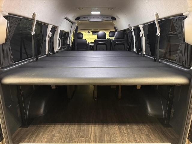 ハイエースワゴン グランドキャビン　Ｔ－Ｆｏｒｃｅスポイラー　オーバーフェンダー　ＸＲ－６　アルミホイール　オープンカントリー　フロントスタビライザー　リアスタビライザー　社外リーフスプリング　ショックアブソーバー　ＢＩＧ－Ｘナビ（4枚目）