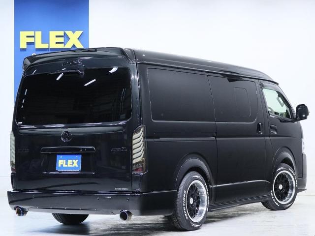 ハイエースバン スーパーＧＬ　ダークプライムＩＩ　デジタルインナーミラー　インテリジェントクリアランスソナー　ＰＶＭ　ＡＣ１００Ｖ　寒冷地仕様　パワスラ　４１５コブラエアロ　ナビ　ＥＴＣ　床張り　ベットキット　１．５ｉｎローダウン　テールランプ（20枚目）