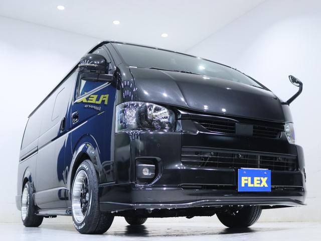 ハイエースバン スーパーＧＬ　ダークプライムＩＩ　デジタルインナーミラー　インテリジェントクリアランスソナー　ＰＶＭ　ＡＣ１００Ｖ　寒冷地仕様　パワスラ　４１５コブラエアロ　ナビ　ＥＴＣ　床張り　ベットキット　１．５ｉｎローダウン　テールランプ（24枚目）