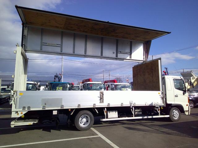 ヒノレンジャー ４トン　ワイド超ロング　アルミウイング　格納パワーゲート　ベッド　荷台内寸長さ６２０センチ　幅２４０センチ　高さ２３０センチ　積載２５５０ｋ　ゲートリモコン　バックカメラ（8枚目）