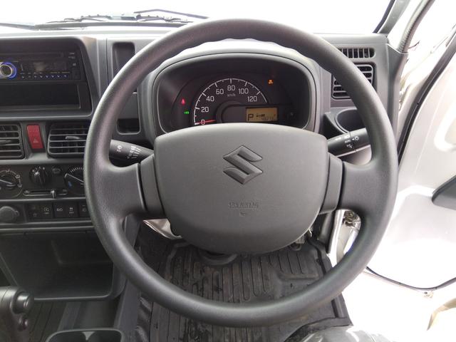 スーパーキャリイ Ｘ　パートタイム４ＷＤ　衝突軽減ブレーキ　キーレスキー　オートＬＥＤ　アイドリングＳＴＯＰ　ＶＳＣ　ＡＢＳ　Ａライト　禁煙　ＬＥＤライト　エアコン　パワステ　ＰＳ　前席ＰＷ　運転席エアバック　幌キット（16枚目）