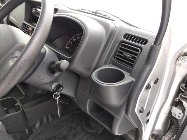 スーパーキャリイ Ｘ　パートタイム４ＷＤ　衝突軽減ブレーキ　キーレスキー　オートＬＥＤ　アイドリングＳＴＯＰ　ＶＳＣ　ＡＢＳ　Ａライト　禁煙　ＬＥＤライト　エアコン　パワステ　ＰＳ　前席ＰＷ　運転席エアバック　幌キット（22枚目）