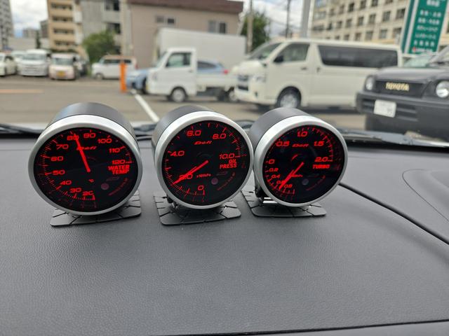 ランサー GSRエボリューションX 4WD SST ナビ アルミホイール オートライト HID AT スマートキー 電動格納ミラー 盗難防止システム 衝突安全ボディ ABS ESC エアコン パワーステアリング パワーウィンドウ(3枚目)