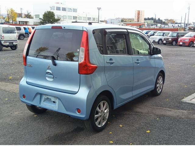 eKワゴン Gセーフティパッケージ 4WD 衝突軽減ブレーキ Bluetooth 全周囲カメラ バックカメラ 社外ナビTV エンジンスターター スマートキー シートヒーター ミラーヒーター アイドリングストップ 誤発進抑制装置(34枚目)