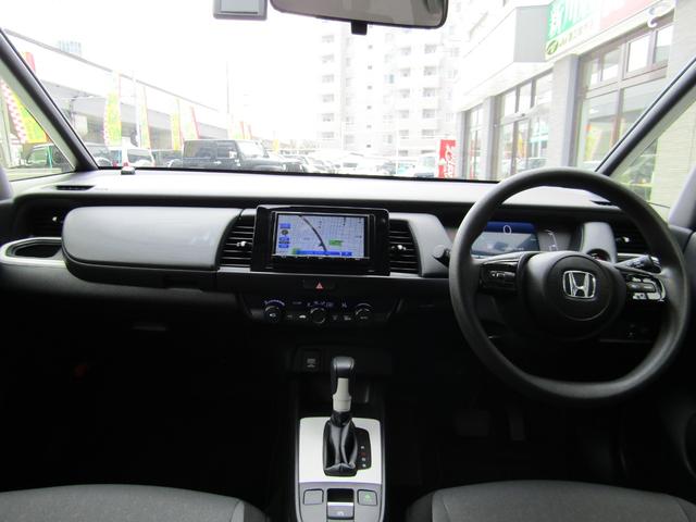 フィット e:HEVベーシック 4WD リヤカメラ イクリプスナビBT コンフォートビューPKG/ミラーヒーター/前窓熱線 センシング/ブレーキ/歩行者・車線検出操舵支援/先行発進/渋滞追従/誤発進/パーキングセンサー/標識認識 フルLEDヘッドライト スマキー ドラレコ(23枚目)