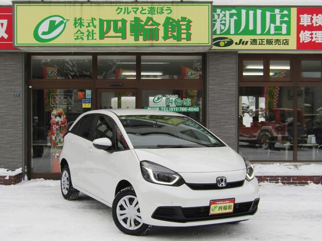 フィット e:HEVベーシック 4WD リヤカメラ イクリプスナビBT コンフォートビューPKG/ミラーヒーター/前窓熱線 センシング/ブレーキ/歩行者・車線検出操舵支援/先行発進/渋滞追従/誤発進/パーキングセンサー/標識認識 フルLEDヘッドライト スマキー ドラレコ(29枚目)