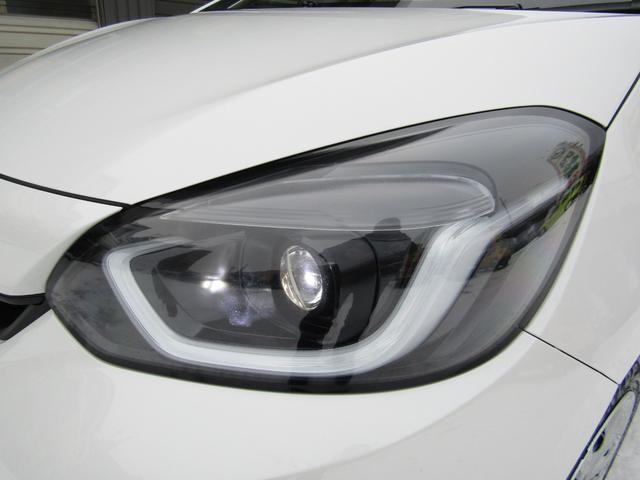 フィット e:HEVベーシック 4WD リヤカメラ イクリプスナビBT コンフォートビューPKG/ミラーヒーター/前窓熱線 センシング/ブレーキ/歩行者・車線検出操舵支援/先行発進/渋滞追従/誤発進/パーキングセンサー/標識認識 フルLEDヘッドライト スマキー ドラレコ(48枚目)