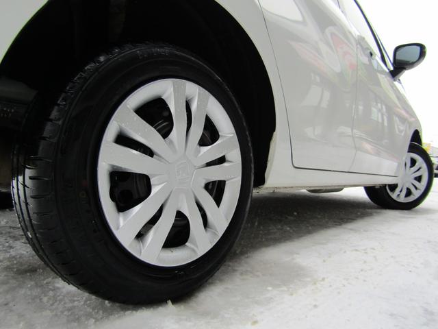 フィット e:HEVベーシック 4WD リヤカメラ イクリプスナビBT コンフォートビューPKG/ミラーヒーター/前窓熱線 センシング/ブレーキ/歩行者・車線検出操舵支援/先行発進/渋滞追従/誤発進/パーキングセンサー/標識認識 フルLEDヘッドライト スマキー ドラレコ(52枚目)