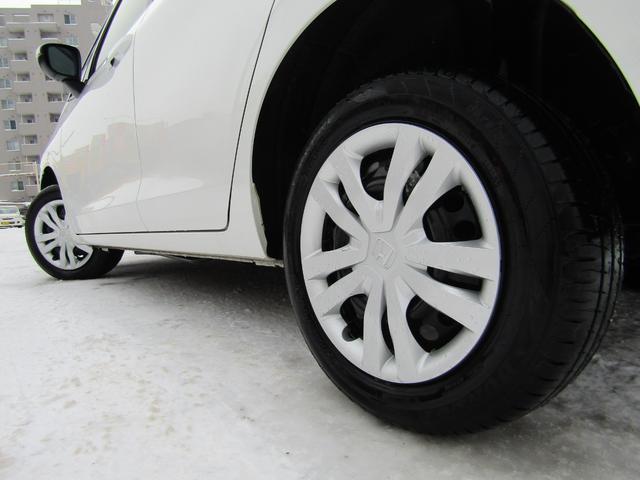 フィット e:HEVベーシック 4WD リヤカメラ イクリプスナビBT コンフォートビューPKG/ミラーヒーター/前窓熱線 センシング/ブレーキ/歩行者・車線検出操舵支援/先行発進/渋滞追従/誤発進/パーキングセンサー/標識認識 フルLEDヘッドライト スマキー ドラレコ(53枚目)