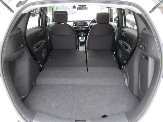 フィット e:HEVベーシック 4WD リヤカメラ イクリプスナビBT コンフォートビューPKG/ミラーヒーター/前窓熱線 センシング/ブレーキ/歩行者・車線検出操舵支援/先行発進/渋滞追従/誤発進/パーキングセンサー/標識認識 フルLEDヘッドライト スマキー ドラレコ(58枚目)