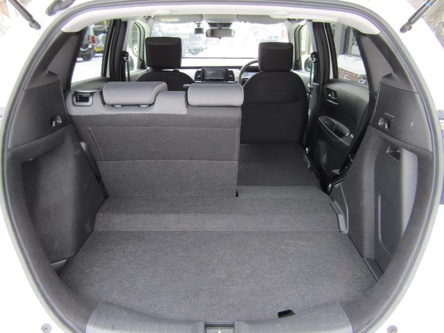 フィット e:HEVベーシック 4WD リヤカメラ イクリプスナビBT コンフォートビューPKG/ミラーヒーター/前窓熱線 センシング/ブレーキ/歩行者・車線検出操舵支援/先行発進/渋滞追従/誤発進/パーキングセンサー/標識認識 フルLEDヘッドライト スマキー ドラレコ(59枚目)