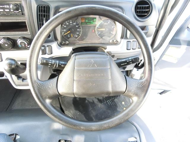 キャンター 全低床ダンプ　３ｔ　ＡＴ　荷台内寸　長さ３０５ｃｍ　幅１５９ｃｍ　高さ３８ｃｍ　新明和ＤＲ２－０１１０ＳＹ　レベライザー　リヤマッドガード　ＥＴＣ　オールシーズンタイヤ　アオリガード（43枚目）