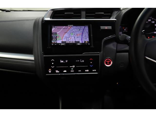 フィットハイブリッド F 4WD スマートキー Pスタート 社外ナビ ETC 衝突軽減サポート Iストップ レーンアシスト ヒーターミラー ワイパーデアイサー クルコン レンタ使用車(42枚目)