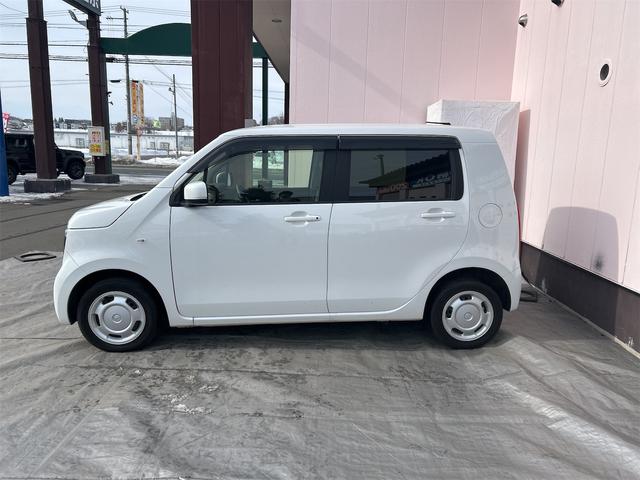 Ｎ－ＷＧＮ Ｌホンダセンシング　４ＷＤ　ＥＴＣ　バックカメラ　ナビ　クリアランスソナー　オートクルーズコントロール　レーンアシスト　衝突被害軽減システム　オートライト　スマートキー　アイドリングストップ　電動格納ミラー（7枚目）