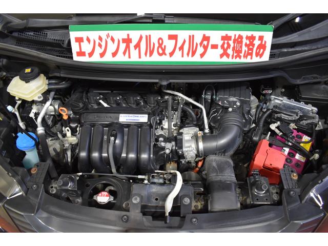 フリードハイブリッド ハイブリッド・Gホンダセンシング 4WD純正ナビDTVバックカメラ 後席モニター 両側パワースライドドア ホンダセンシング クルーズコントロール ETC シートヒーター プッシュスタート フォーグランプ(2枚目)