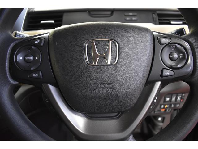 フリードハイブリッド ハイブリッド・Gホンダセンシング 4WD純正ナビDTVバックカメラ 後席モニター 両側パワースライドドア ホンダセンシング クルーズコントロール ETC シートヒーター プッシュスタート フォーグランプ(12枚目)