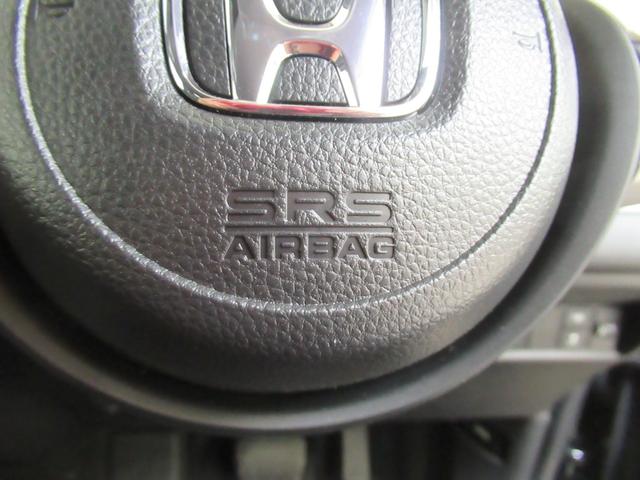 フィット ｅ：ＨＥＶホーム　ワンオーナー　衝突軽減ブレーキ　車間維持クルーズコントロール　レーンアシスト　純正メモリーナビ　フルセグ　バックカメラ　純正ドライブレコーダー　ＥＴＣ車載器　夏冬タイヤ（26枚目）