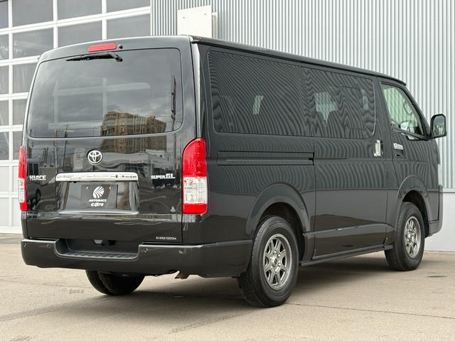 ハイエースバン ロングスーパーGL 4WD 寒冷地仕様・リヤヒーター パノラミックビューモニター ホイール付スタッドレスタイヤ セーフティセンス 純正ナビ・フルセグTV・DVD再生 ETC オートエアコン LEDヘッドライト(2枚目)