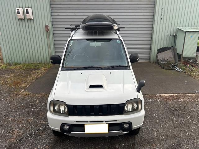 ジムニー ＦＩＳフリースタイルワールドカップリミテッド　４ＷＤ　ナビ　テレビ　ＥＴＣ　ターボタイマー　夏冬タイヤ　スペアキー　曇止め用ヒーター機能付ドアミラー　シートヒーター　ルーフキャリア（2枚目）