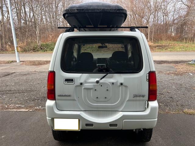 ジムニー ＦＩＳフリースタイルワールドカップリミテッド　４ＷＤ　ナビ　テレビ　ＥＴＣ　ターボタイマー　夏冬タイヤ　スペアキー　曇止め用ヒーター機能付ドアミラー　シートヒーター　ルーフキャリア（9枚目）