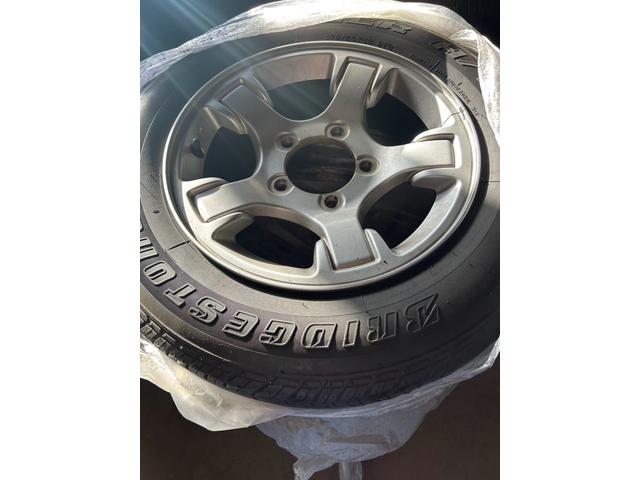 ジムニー ＦＩＳフリースタイルワールドカップリミテッド　４ＷＤ　ナビ　テレビ　ＥＴＣ　ターボタイマー　夏冬タイヤ　スペアキー　曇止め用ヒーター機能付ドアミラー　シートヒーター　ルーフキャリア（25枚目）