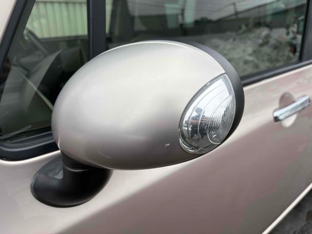 アルトラパンショコラ Ｘ　４ＷＤ　オートライト　ＨＩＤ　スマートキー　アイドリングストップ　電動格納ミラー　シートヒーター　ベンチシート　ＣＶＴ　盗難防止システム　ＡＢＳ　ＣＤ　ＵＳＢ　衝突安全ボディ　エアコン（10枚目）