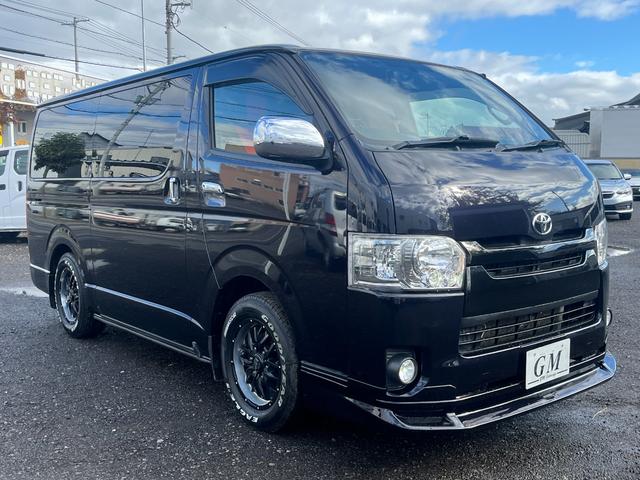 レジアスエースバン スーパーGL ダークプライム スマートキー プッシュスタート 社外SDナビ バックカメラ ETC 両側パワースライドドア LEDヘッドライト 社外Fリップスポイラー 社外テール ベッドキット(3枚目)