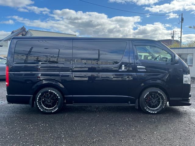 レジアスエースバン スーパーGL ダークプライム スマートキー プッシュスタート 社外SDナビ バックカメラ ETC 両側パワースライドドア LEDヘッドライト 社外Fリップスポイラー 社外テール ベッドキット(4枚目)