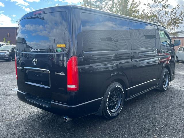 レジアスエースバン スーパーGL ダークプライム スマートキー プッシュスタート 社外SDナビ バックカメラ ETC 両側パワースライドドア LEDヘッドライト 社外Fリップスポイラー 社外テール ベッドキット(5枚目)