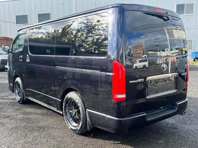 レジアスエースバン スーパーGL ダークプライム スマートキー プッシュスタート 社外SDナビ バックカメラ ETC 両側パワースライドドア LEDヘッドライト 社外Fリップスポイラー 社外テール ベッドキット(7枚目)