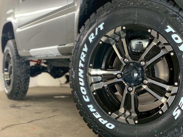ジムニー ＸＣ　届出済未使用車／３インチリフトアップ／ＴＯＹＯオープンカントリーＲＴ１８５・８５Ｒ１６／ナイトロパワークロスクロー当社オリジナルカラー１６インチＡＷ（20枚目）